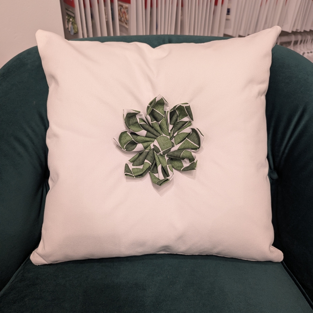 Chic White Pillow with Green Thibaut Fabric Flower.